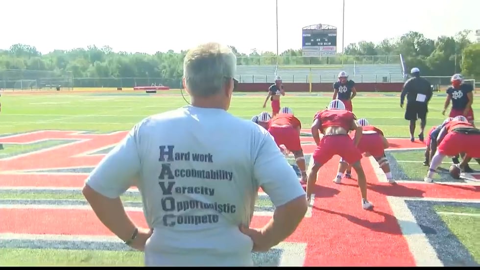 North DeSoto head coach Dennis Dunn looks during Griffins practice