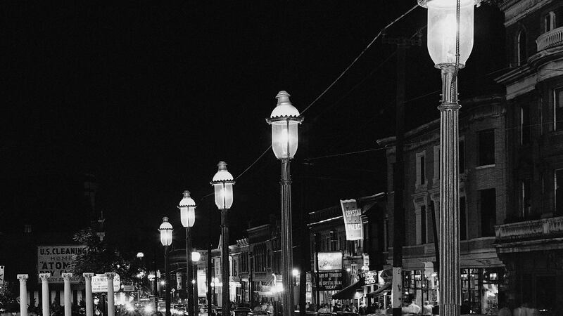 FILE - Gas lamps illuminate St. Louis' Gaslight Square on April 2, 1962. "Gaslighting" — mind...