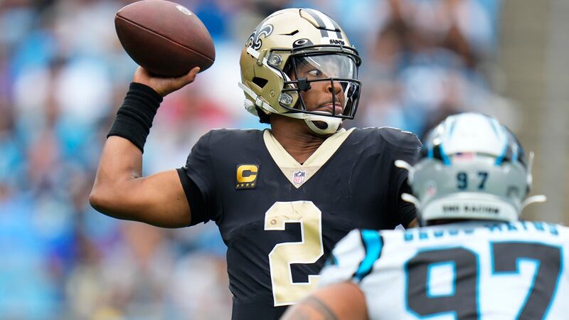 Saints quarterback Jameis Winston attempts to pass during the first half of Sunday's loss to...