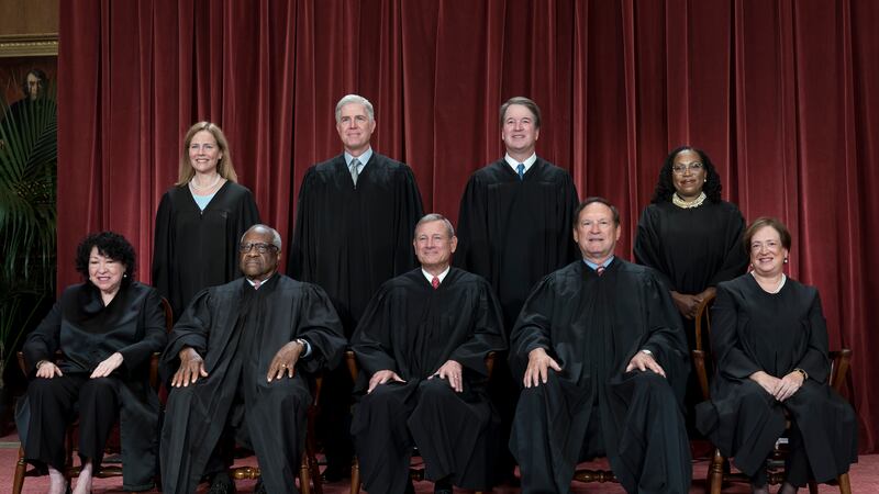 Members of the Supreme Court sit for a new group portrait following the addition of Associate...