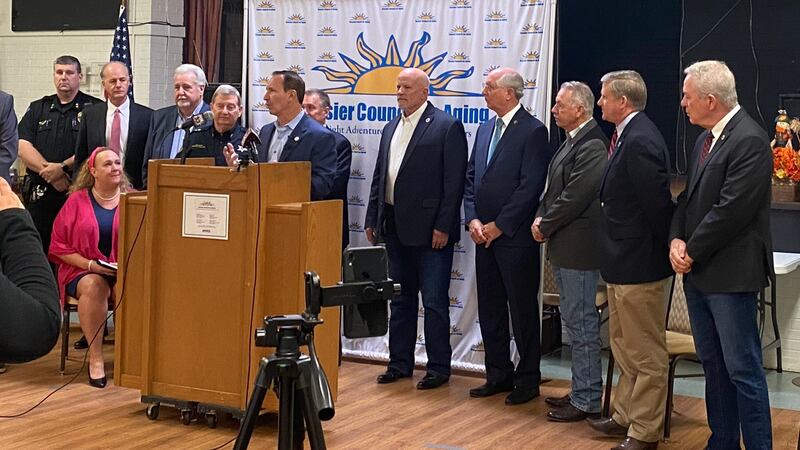 Louisiana Attorney General Jeff Landry (at podium) spoke during an event along with...