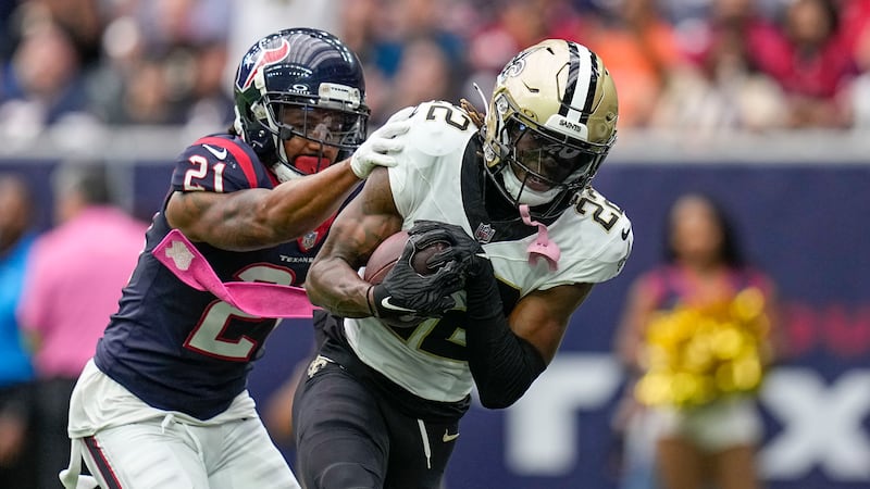 Saints wide receiver Rashid Shaheed (22) pulls in a touchdown pass against Texans cornerback...