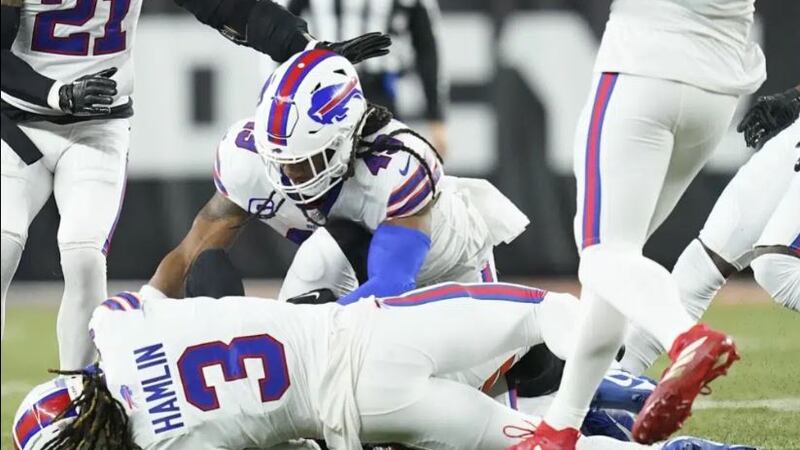 Buffalo Bills safety Damar Hamlin (3) lies on the turf after making a tackle on Cincinnati...