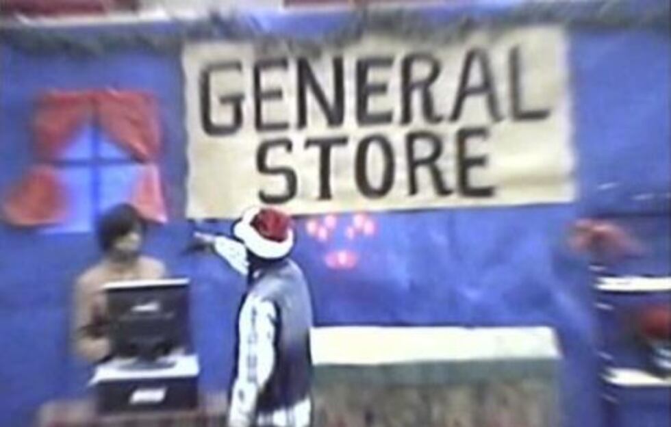 A "thug" character shoots a clerk in "Gangsta Claus," a play performed by drama students at...