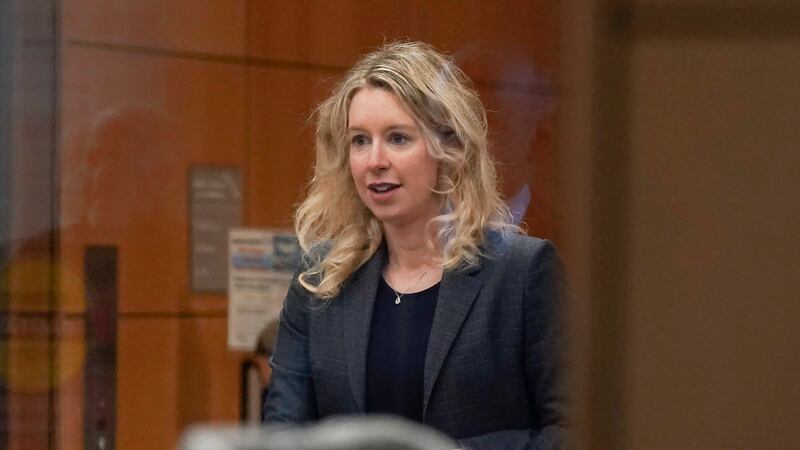 Former Theranos CEO Elizabeth Holmes arrives at federal court in San Jose, Calif., on Oct. 17,...