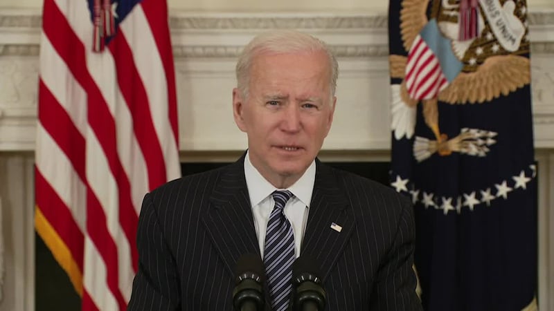 President Joe Biden urges Americans to get vaccines and continue wearing masks until enough...