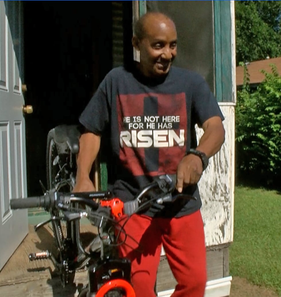 Wayne Willis, 72, shows off his brand-new bicycle just delivered this week by Shreveport...