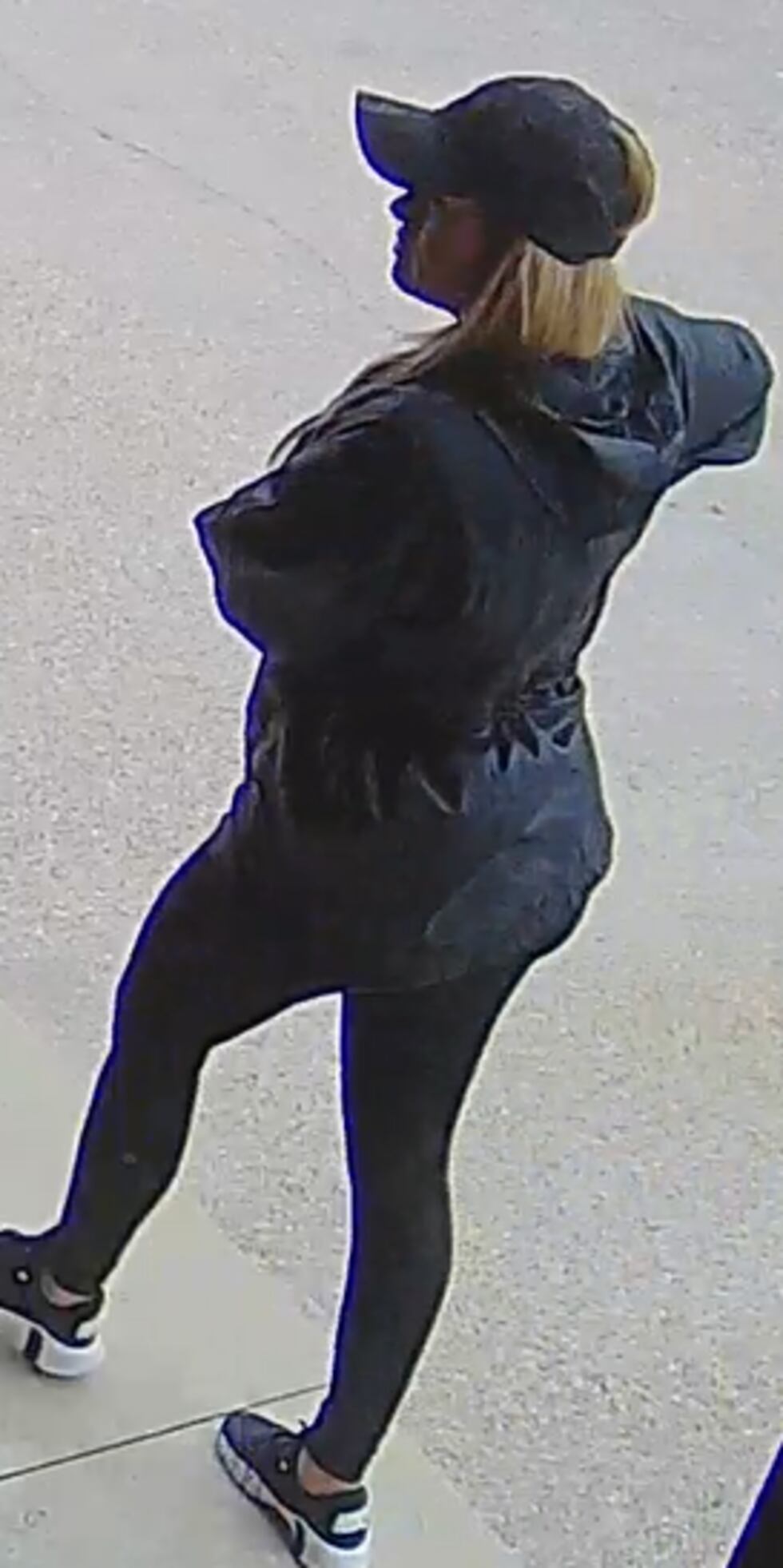 Police are looking for the above pictured woman in connection with a theft at a jewelry store...