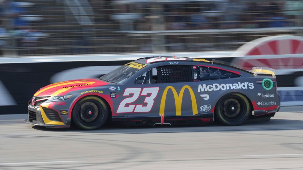 Bubba Wallace competes in a NASCAR Cup Series auto race at Texas Motor Speedway in Fort Worth,...