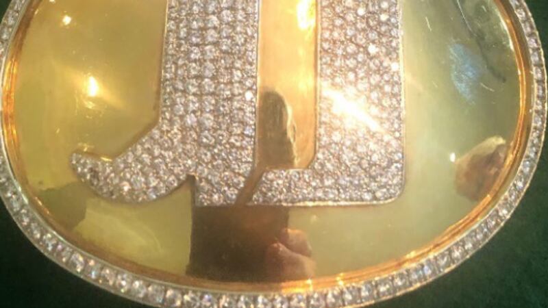 14K gold belt buckle with Jimmy Dean’s initials incrusted with diamonds