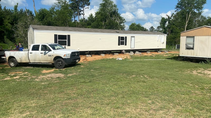 Workers delivered a new mobile home, the product of a three-month effort by the Shreveport...
