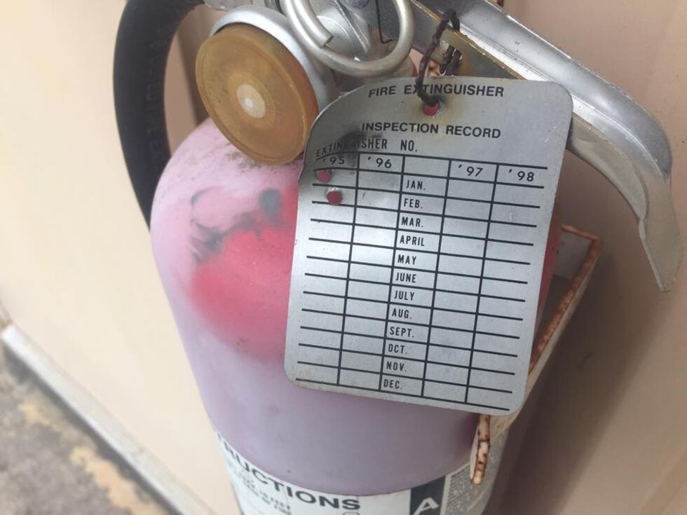 The rusted metal and dated dates on a fire hydrant reveal, the water plant hasn't been used...