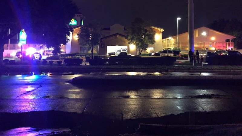 A large police presence is seen at a Bossier City hotel on Friday.