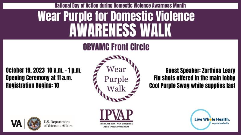 Overton Brooks holding Walk Against Domestic Violence