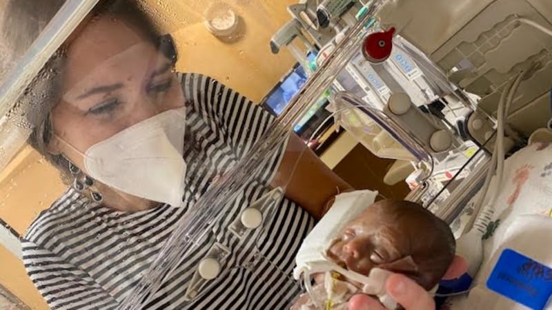 Heather Bourgeois with her newborn, Hadley.