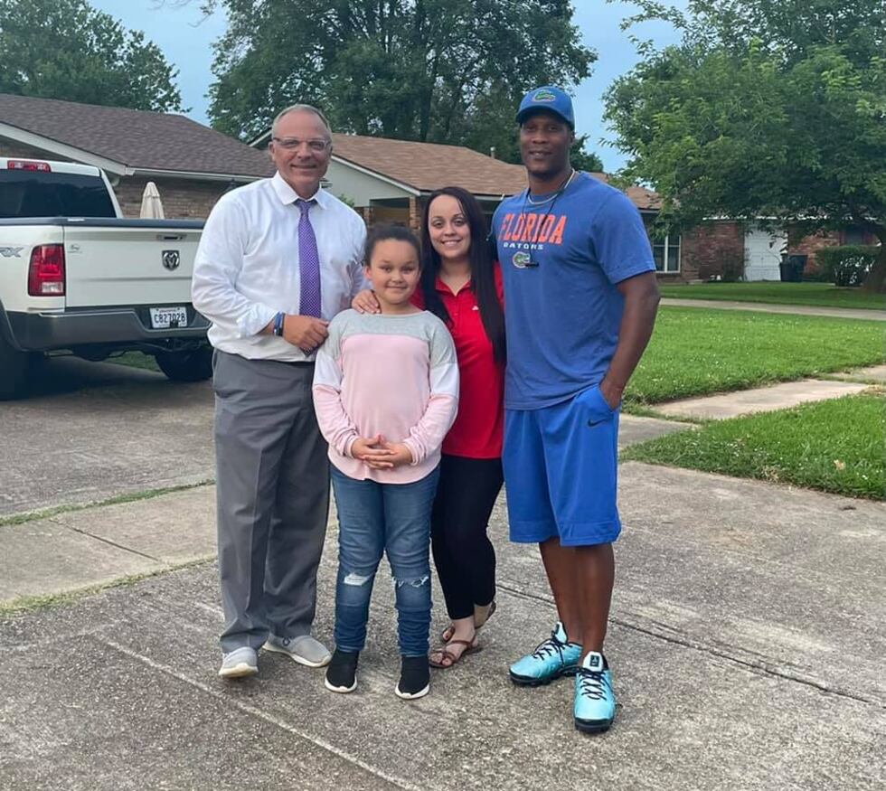 The Leslie family, Rawlis, his wife C.C., and daughter Khloe along with KSLA's Doug Warner