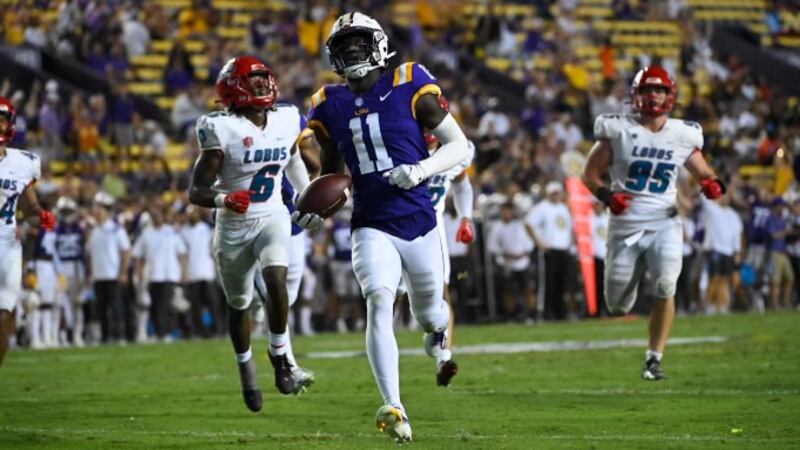 LSU wide receiver Brian Thomas Jr. (11) scores on a 57-yard touchdown against New Mexico.