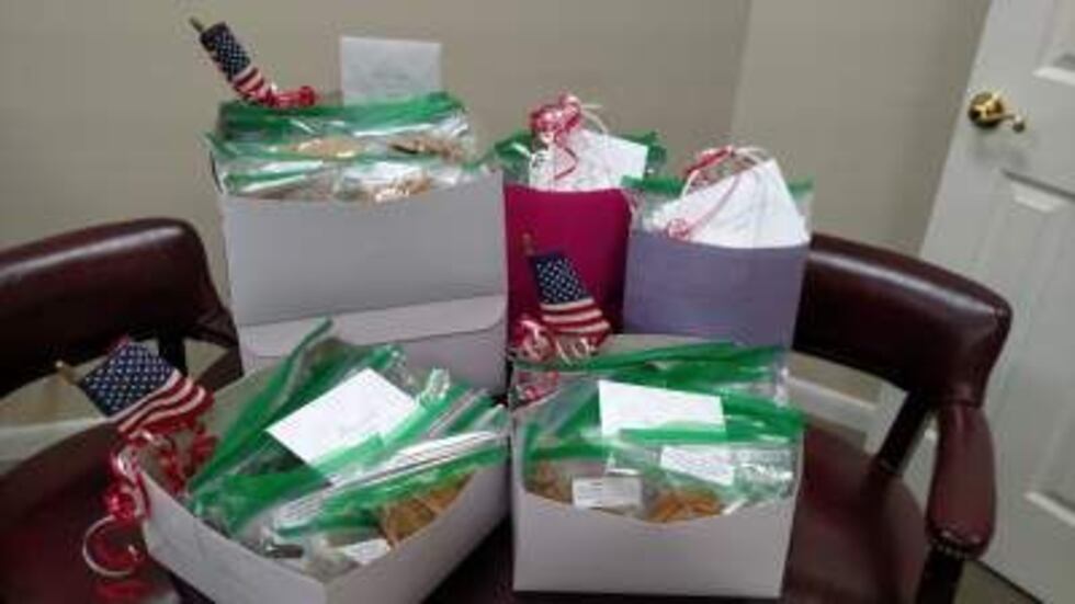 Generational Financial employees bake cookies for police and firemen (Source: Janice Watt)
